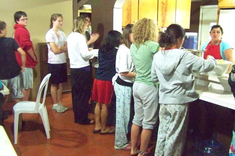 100_3489.JPG - Eating at the mission house.